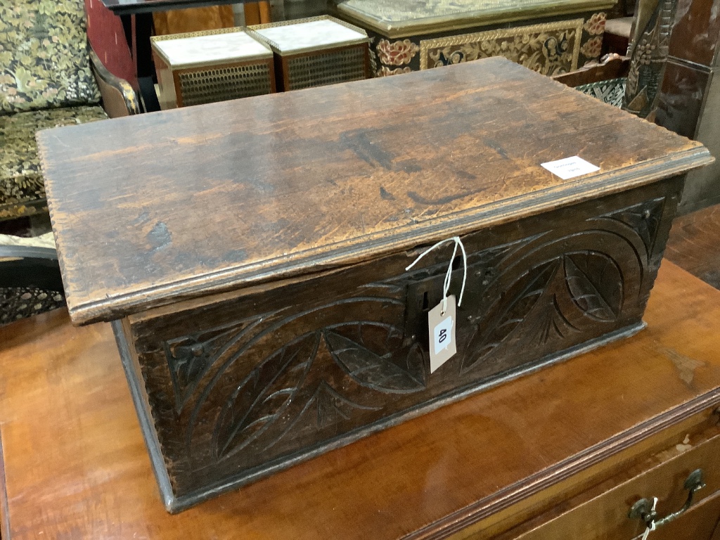 An early 18th century carved oak bible box, width 56cm depth 36cm height 20cm